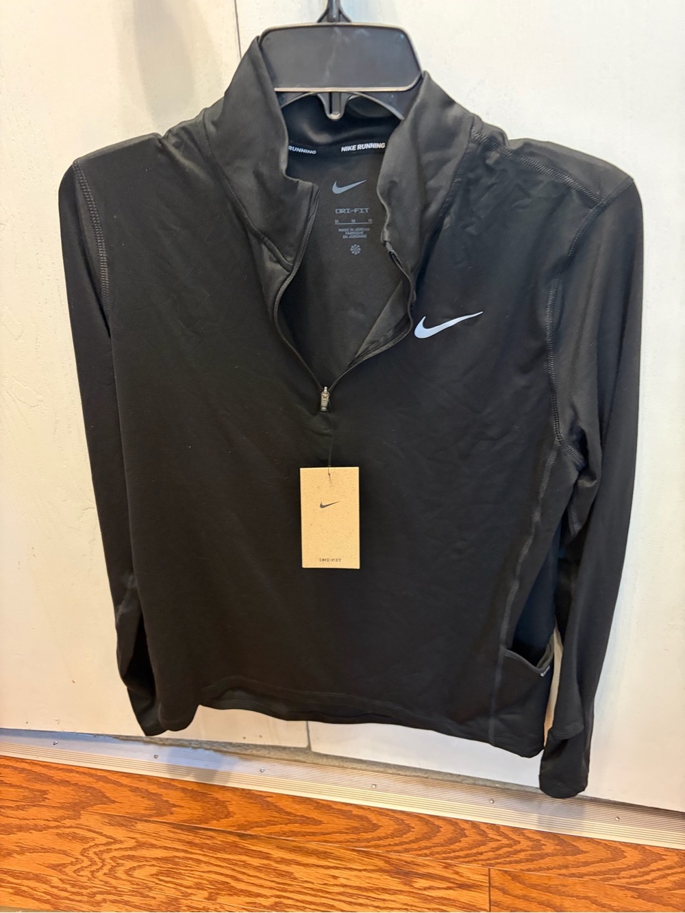 Nike Black Running Quarter-Zip Pullover with White Swoosh
New with tags !!!!!!